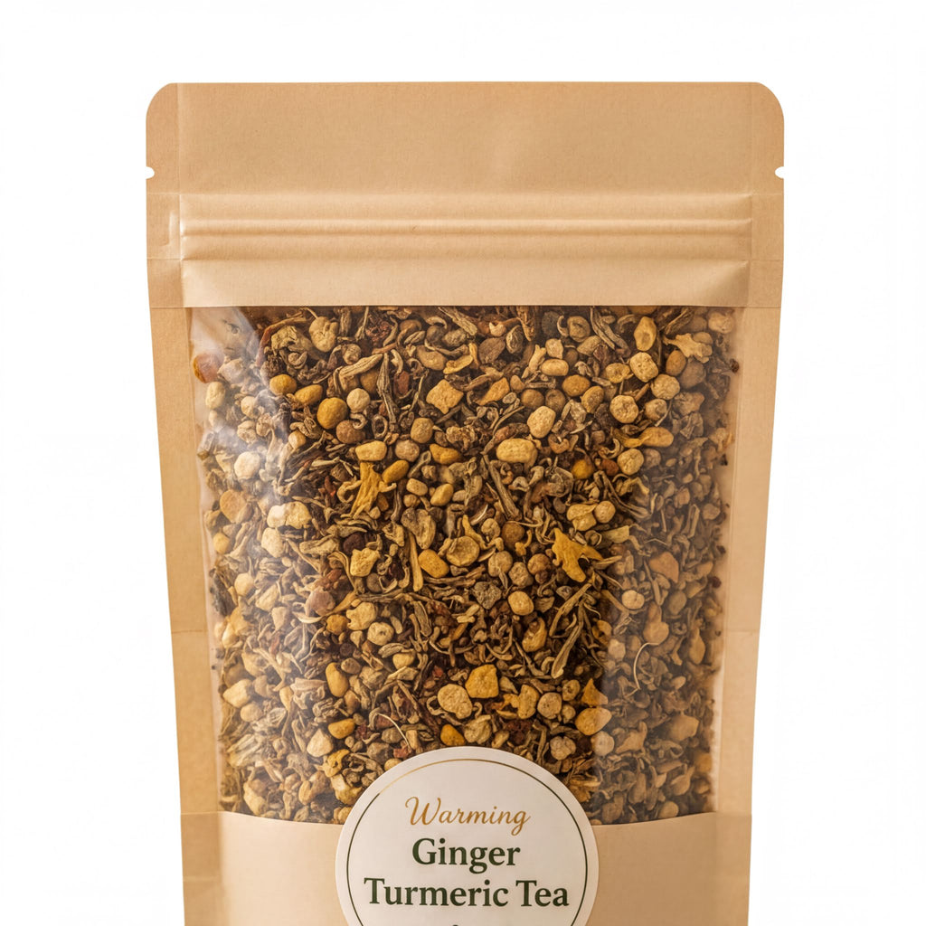 A package of ginger and turmeric tea with a label that reads "Warming Ginger Turmeric Tea".