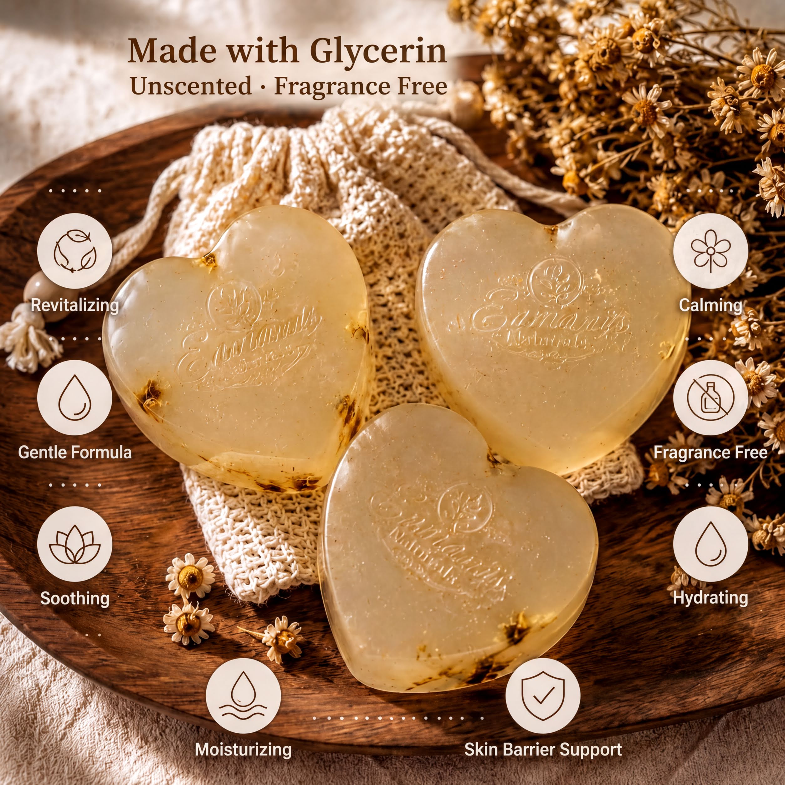 three heart-shaped soaps made with glycerin, placed on a wooden surface. The soaps are described as "made with glycerin" and "unscented", indicating that they are fragrance-free. The soaps are also described as "revitalizing", "calming", "gentle formula", "fragrance free", "soothing", "hydrating", and "skin barrier support".
